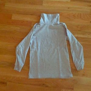 Girls, gray turtleneck.